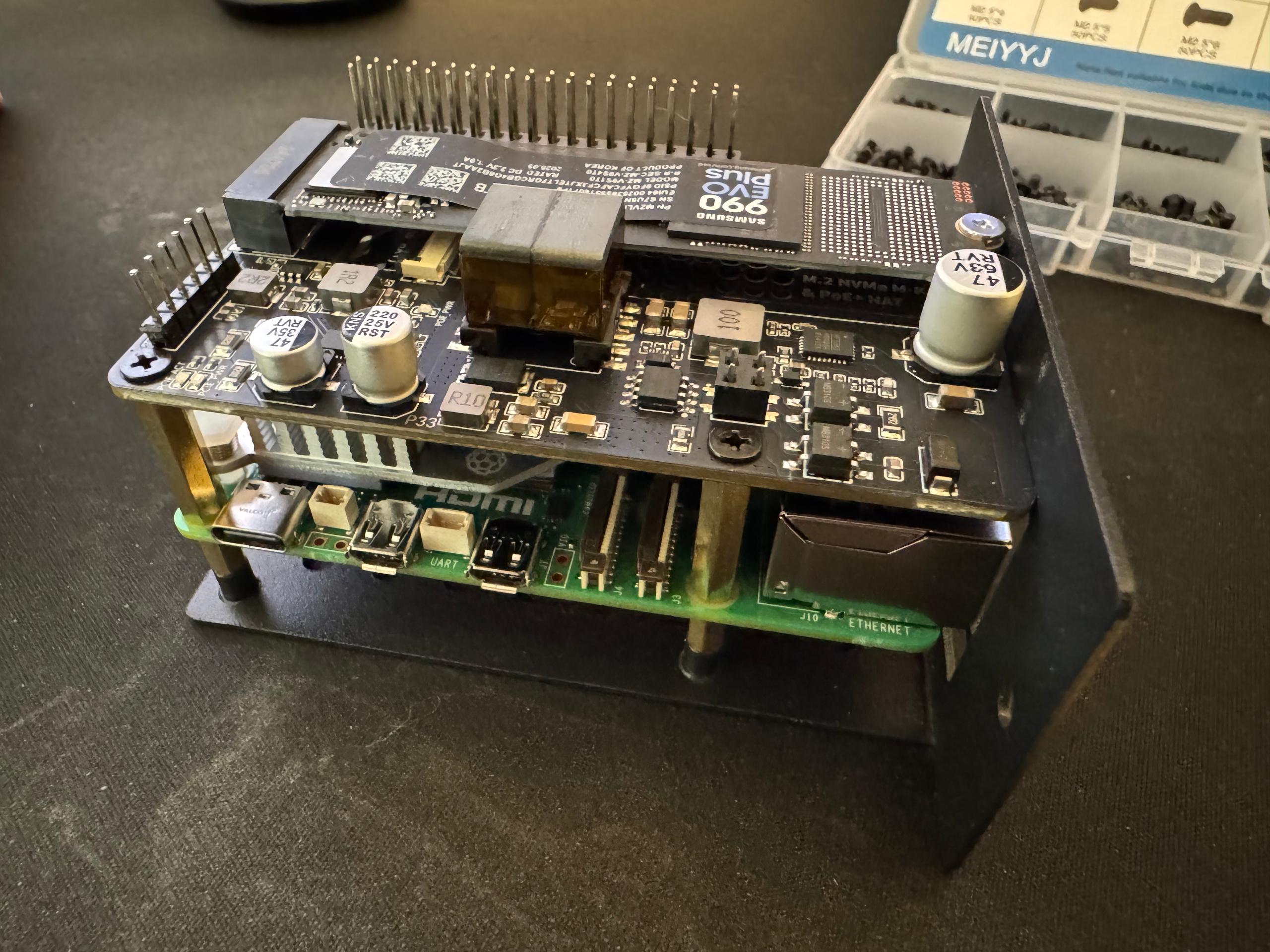 a raspberry pi 5 on its tray before installing it in the kuberenetes cluster inside the 10-inch rack
